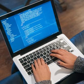 hands-typing-code-on-laptop.jpg